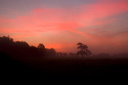 A hazy sunset at Merthyr Mawr