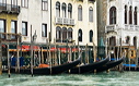 Gondolas at their moorings on the Grand Canal Venice