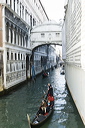 A Gondola passes under the Bridge of Sighs